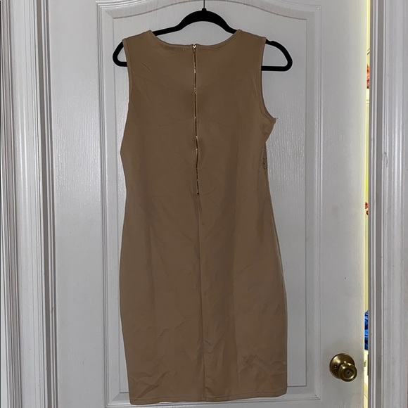 New dress with laser cut out detail - Picture 2 of 2